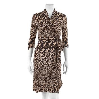 349. DIANE VON FURSTENBERG, a beige and brown printed silk wrap dress. Size US 6.