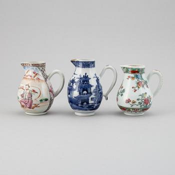 A group of three famille rose and blue and white jugs, Qing dynasty, Qianlong (1736-95).