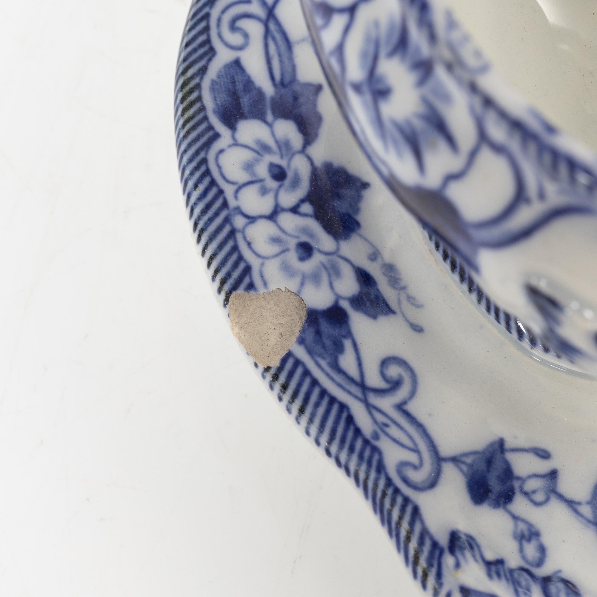 A 42 piece earthenware dinner service, 'Flora', Creil Montereau, France, late 19th Century.