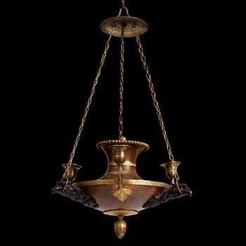 133. A Swedish patinated bronze and copper three-light chandelier, early 19th century.