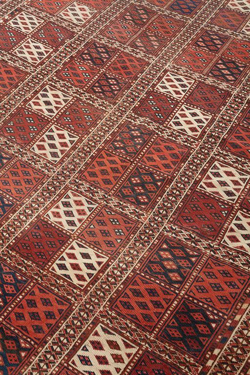 A carpet, an antique Beshir, ca 285,5-289 x 144,5-164,5 cm (as well as several cm red and blue flat weave at the ends).