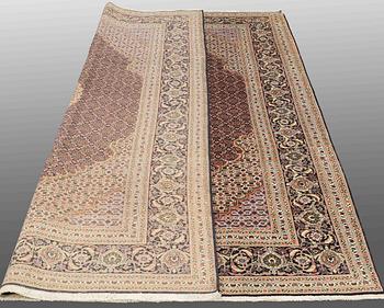A CARPET, Tabriz part silk , so called 40 Radj, ca 298 x 202 cm.