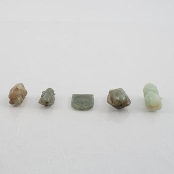 A group of five Chinese stone charms, 20th century.