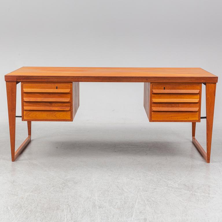 A 1960's teak model 70 writing desk by Kai Kristiansen.