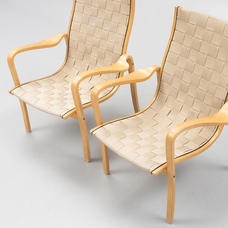 A pair of lounge chairs from Källemo.