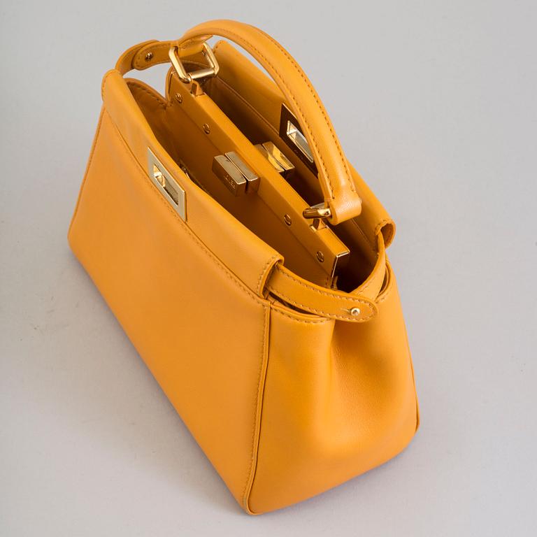 a Fendi 'Peekaboo' bag.