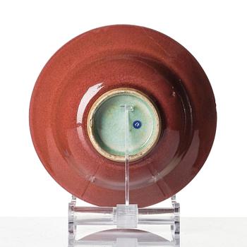 A red glazed bowl, Qing dynasty, 18th century.