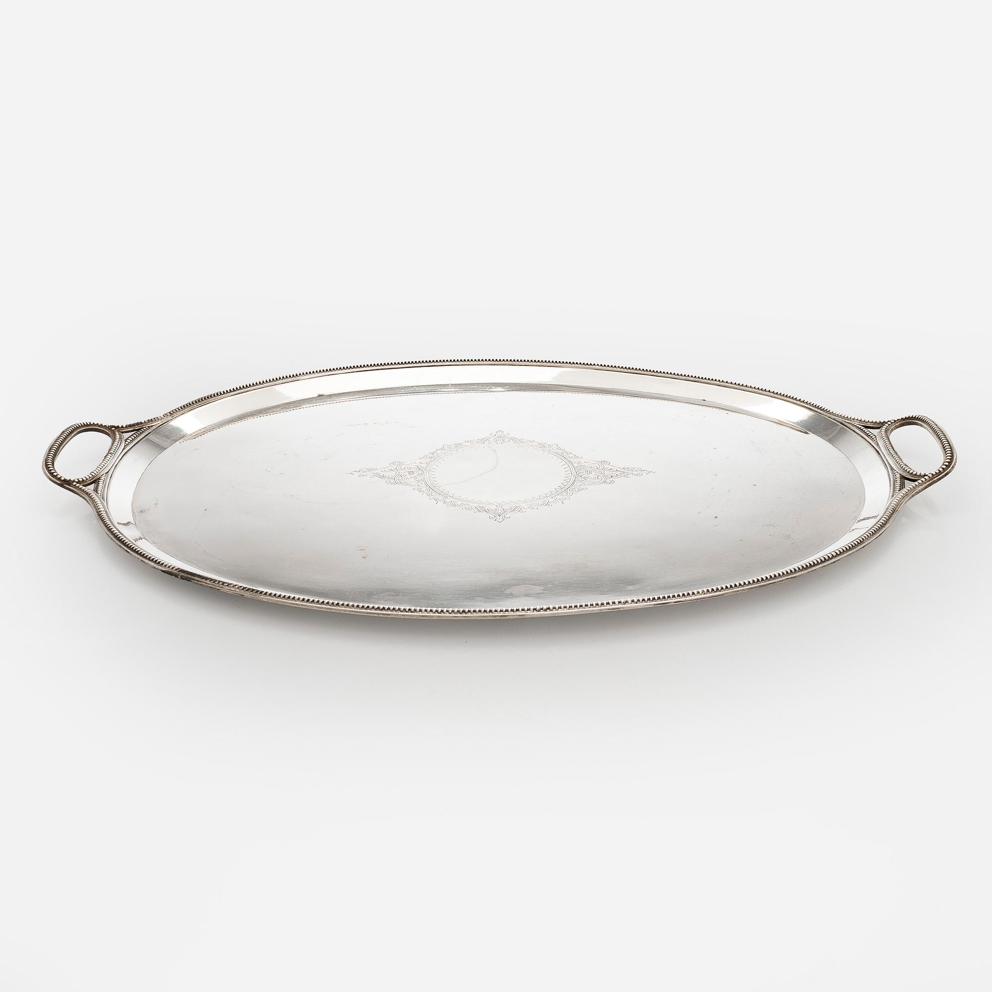 A Khlebnikov silver tray, with the Imperial court supplier's mark, Moscow 1888.