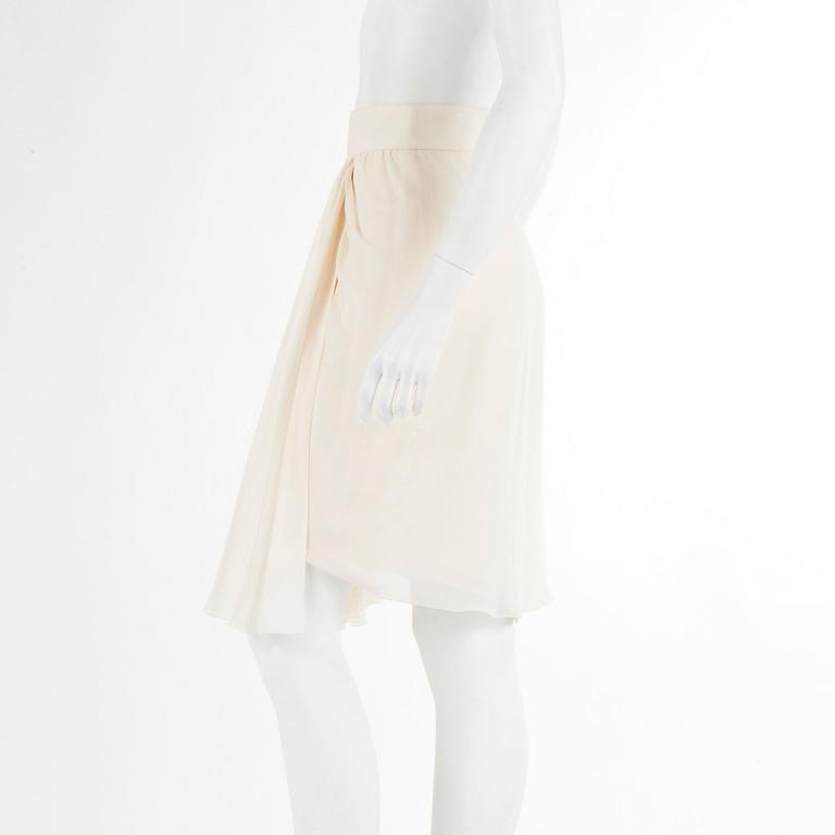 CHANEL, a bonewhite silk skirt. French size 40.