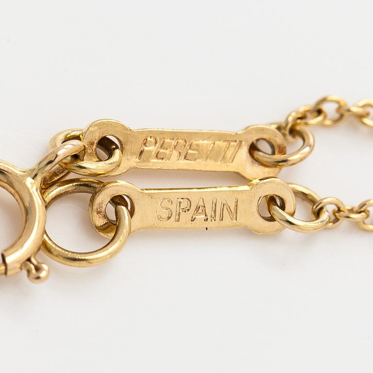 Tiffany & Co, Elsa Peretti, an 18K gold "Open Heart" necklace.