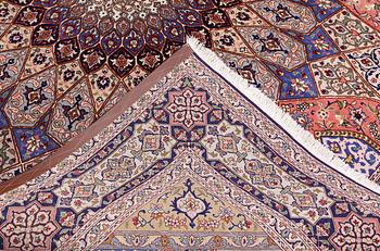 A Tabriz carpet, part silk, so-called 50 Raj, approx. 255 x 200 cm.