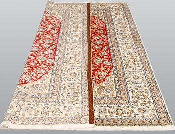 A carpet, Nain part silk so called 9LAA, ca 317 x 202 cm.