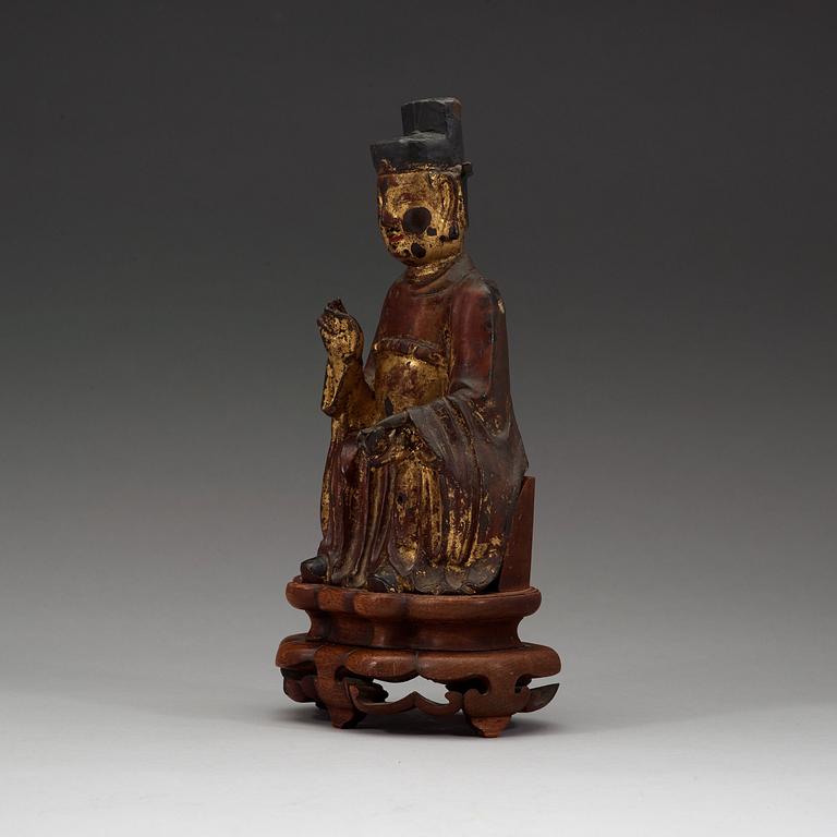 A seated figure of a daoist dignitary, Ming dynasty (1368-1644).