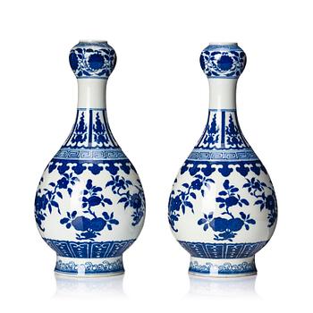 1144. A pair of Chinese blue and white vases, late Qing dynasty/Republic with Qianlong seal mark.