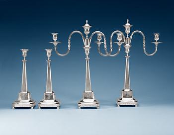 A pair of 18th century silver candelabra and a pair of candlesticks, makers mark of Pehr Zethelius, Stockholm 1796.