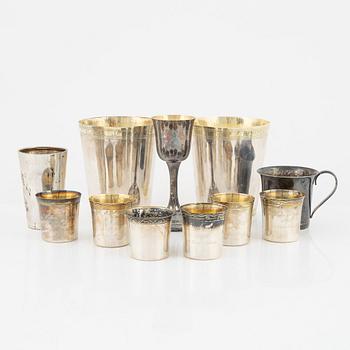 Eleven silver items, including beakers from C.G. Hallberg, Stockholm, 1940s.