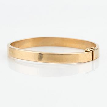 Bangle 18K gold.