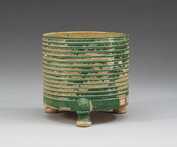 A green and yellow glazed tripod censer, Tang dynasty (618-907).