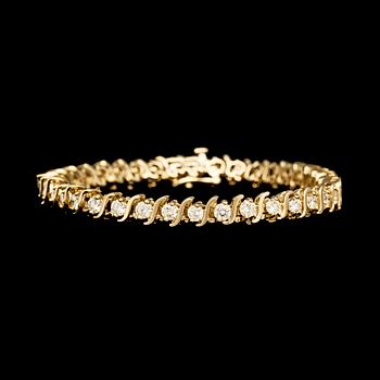 38. ARMBAND, 38 briljantslipade diamanter, tot. ca 5.70 ct.