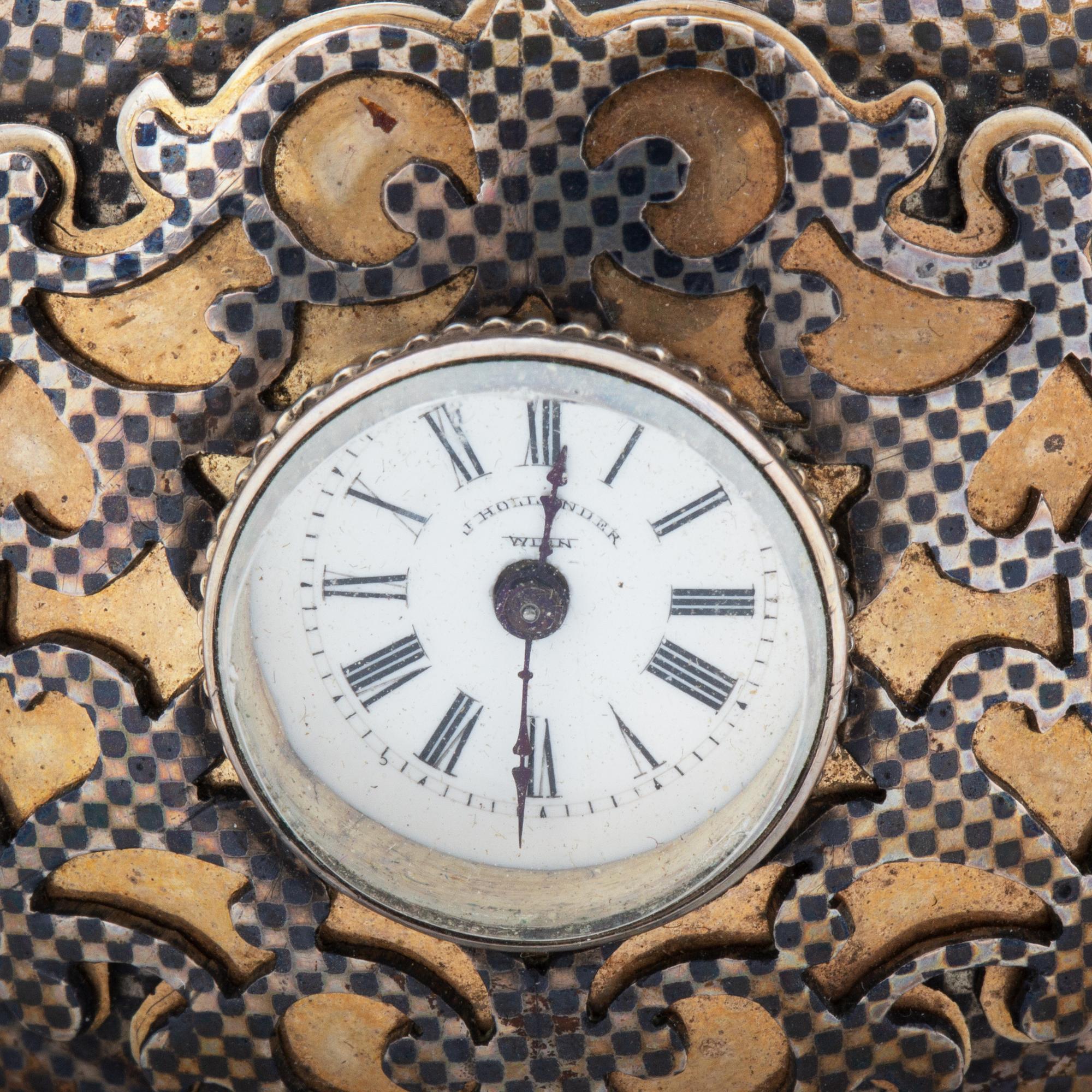 Silver bangle with watch.