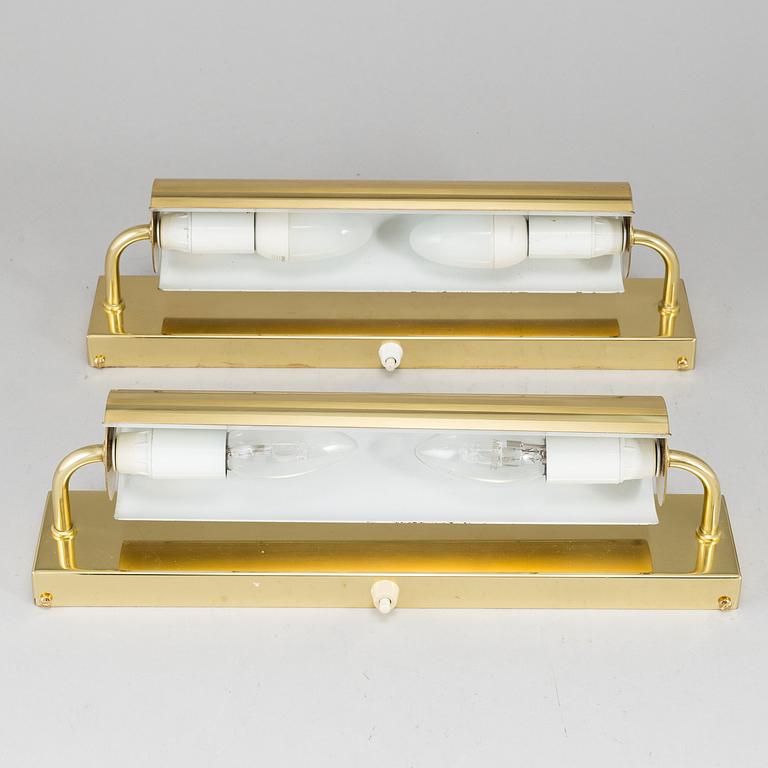 A PAIR OF BRASS WALL LAMPS FROM ÖIA.