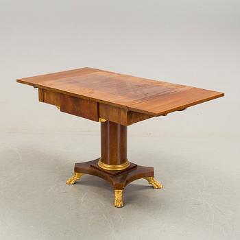 A mahogany table in Karl Johan style early 20th century.