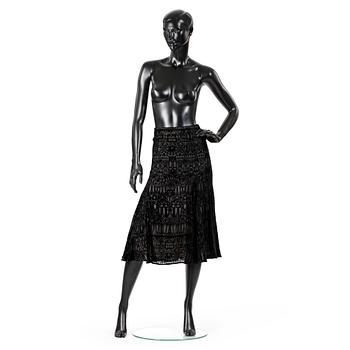 544. ALEXANDER MCQUEEN, a black skirt.