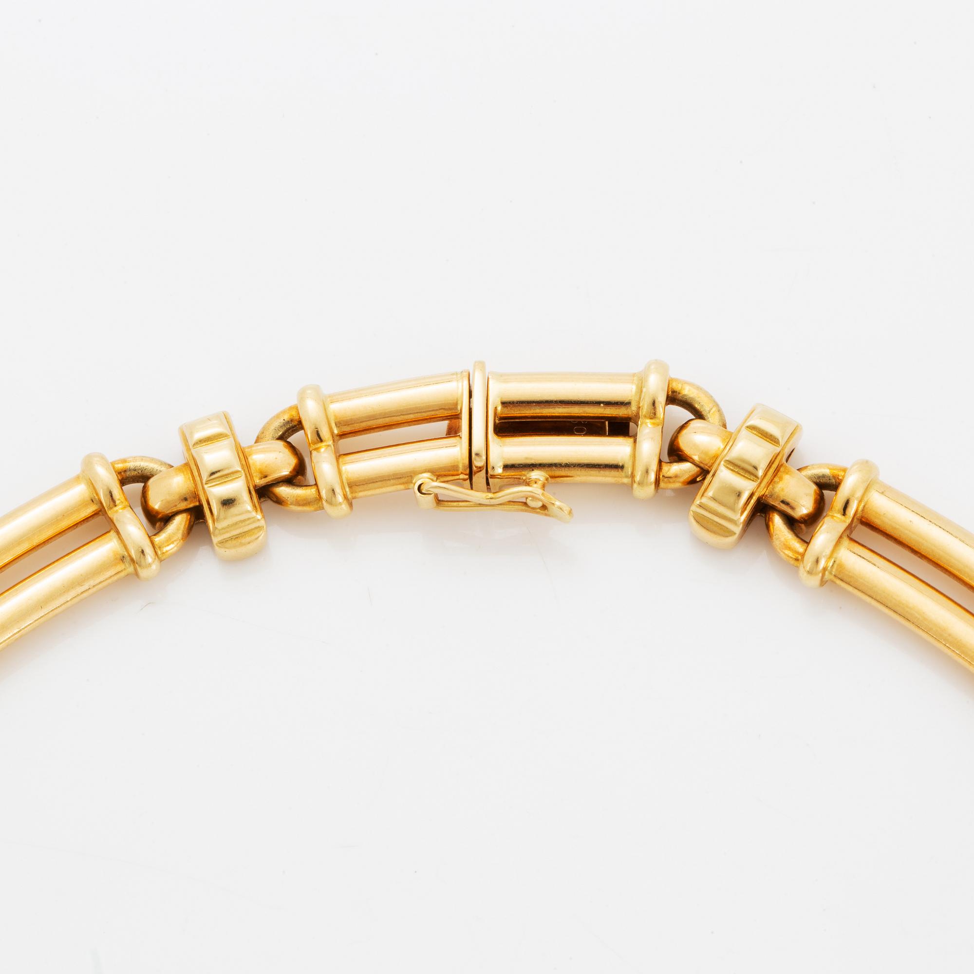 Collier, 18K guld med briljantslipade diamanter och safirer.