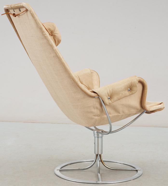 A Bruno Mathsson beige leather and chromed steel 'Jetson' easy chair, DUX.