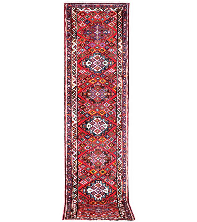 A runner carpet, Hamadan, c. 335 x 86 cm.