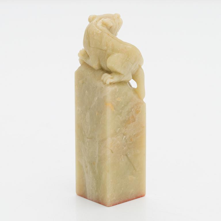 A Chinese seal, green stone, 20th century.