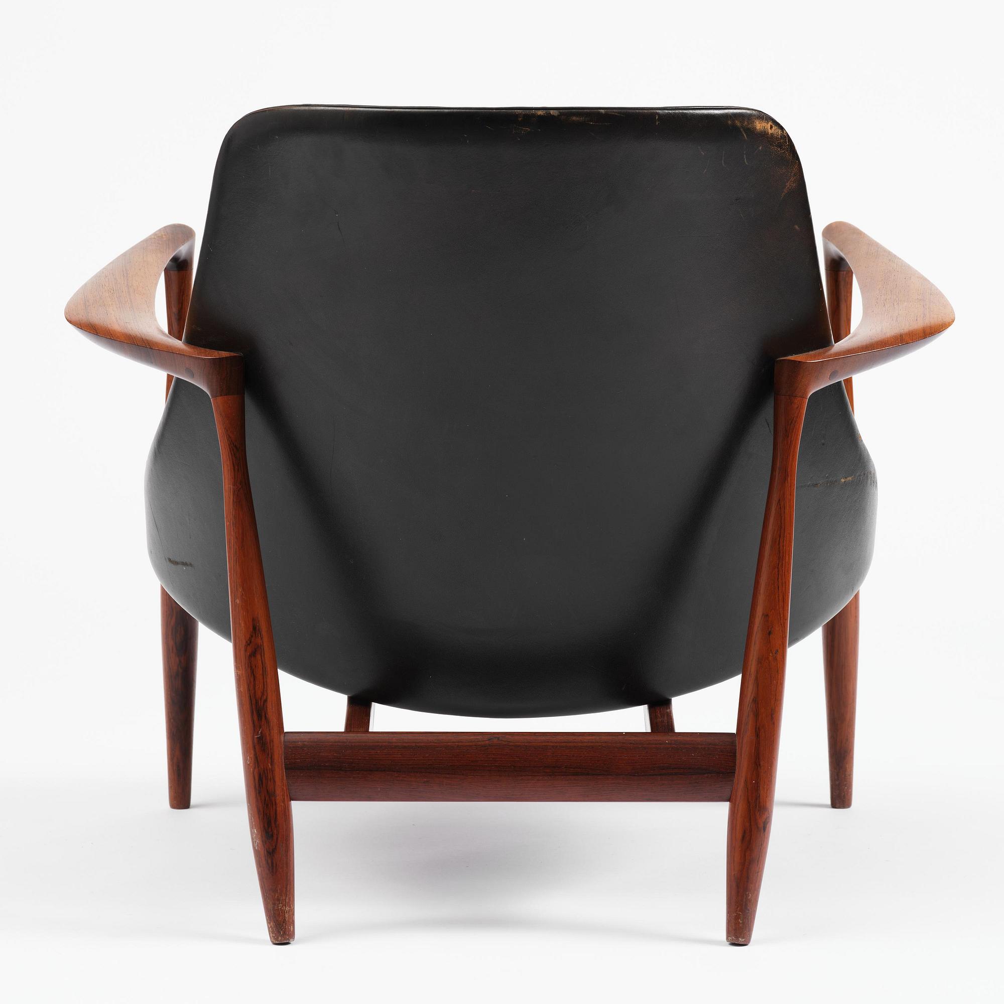 Ib Kofod-Larsen, a rosewood "Elizabeth" easy chair, cabinetmakers Christensen & Larsen, Denmark, 1950s-60s.