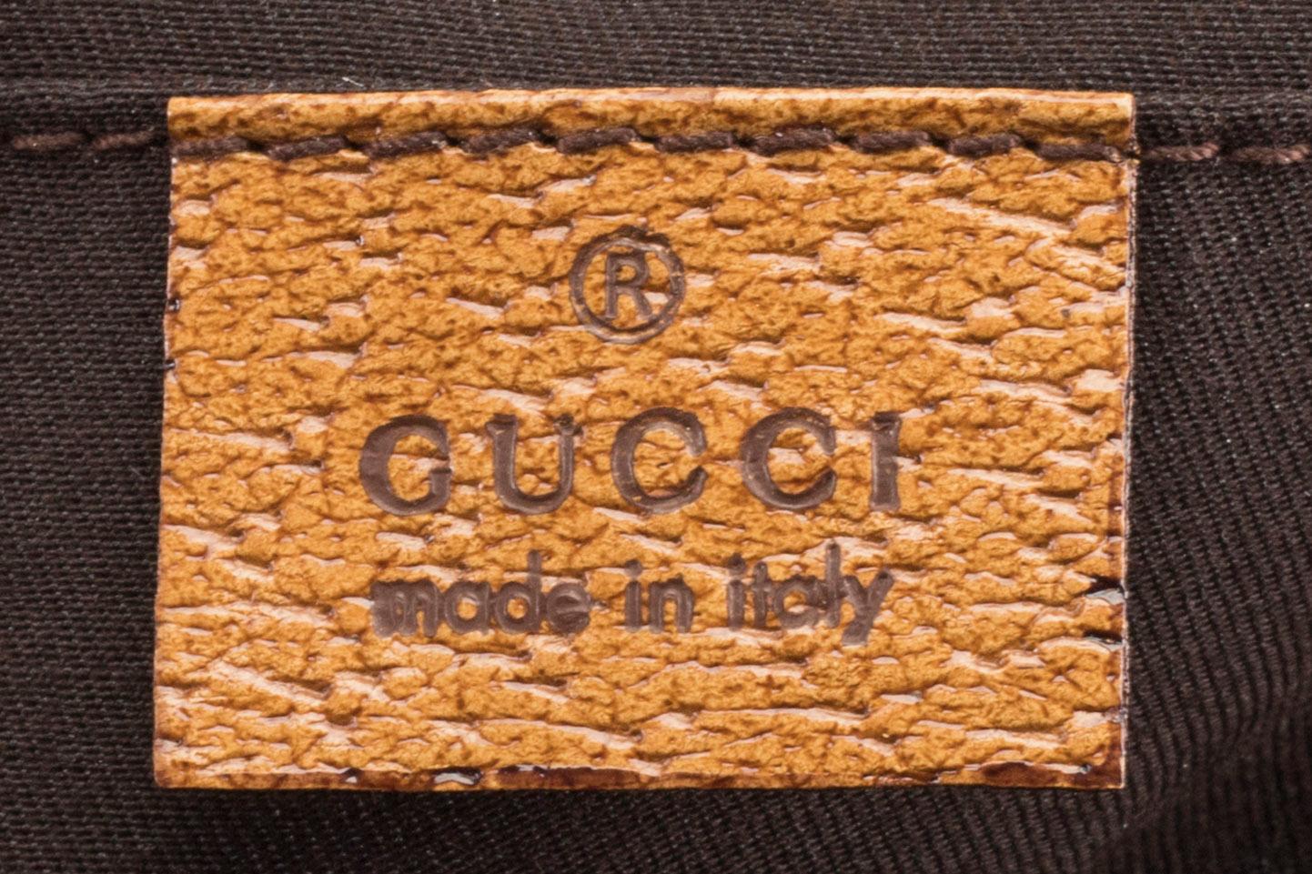 A GUCCI BAG, "STUDDED  BAMBOO HANDLE".