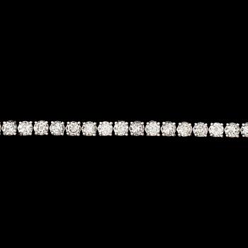 1091. A brilliant cut diamond line bracelet, tot. app. 5.80 cts.