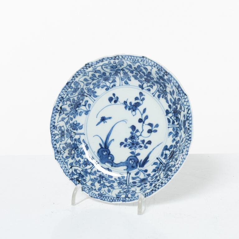 Two Chinese blue and white porcelain dishes and a small dish, Qing dynasty, 18th century.