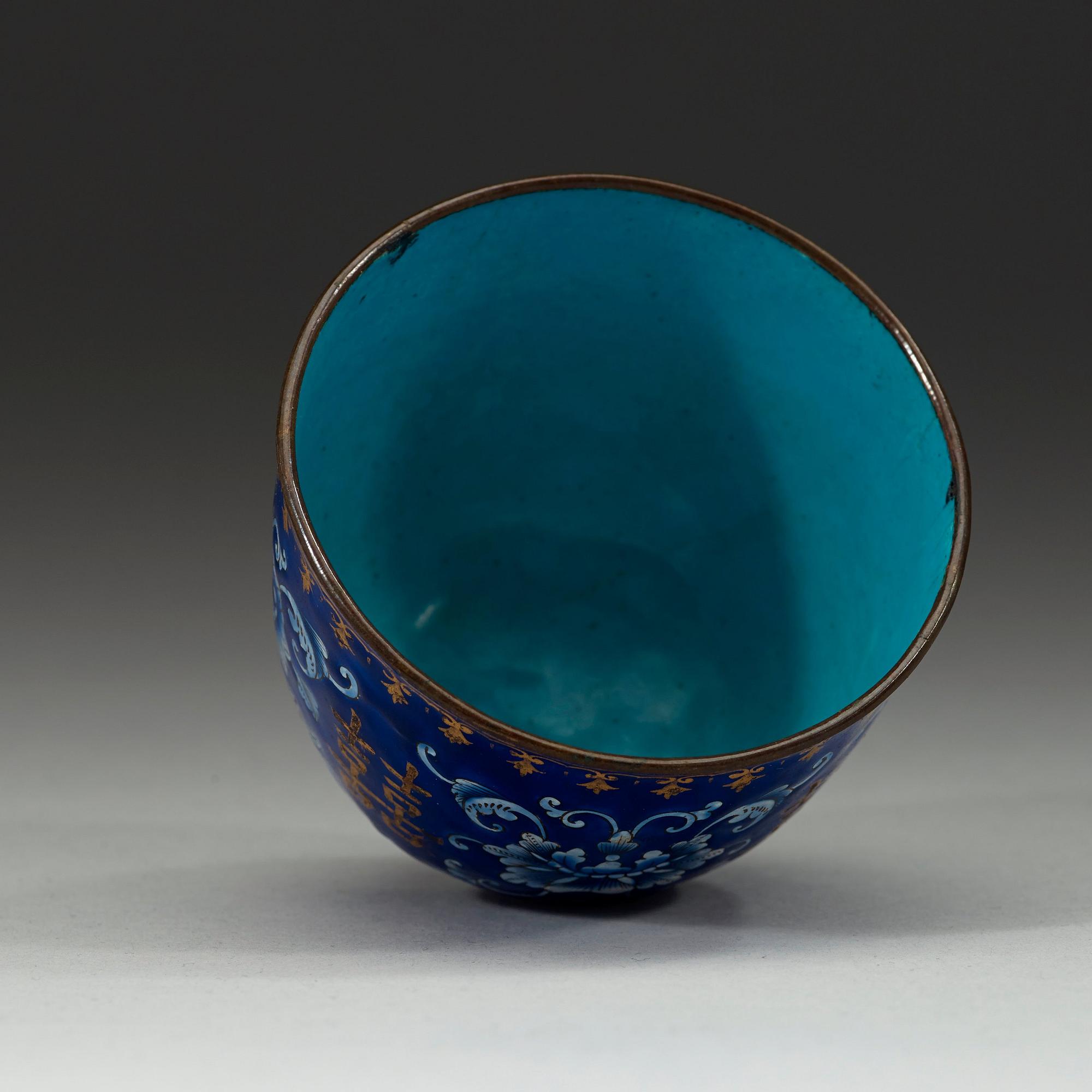A blue enamel cup, Qing dynasty 18th century.