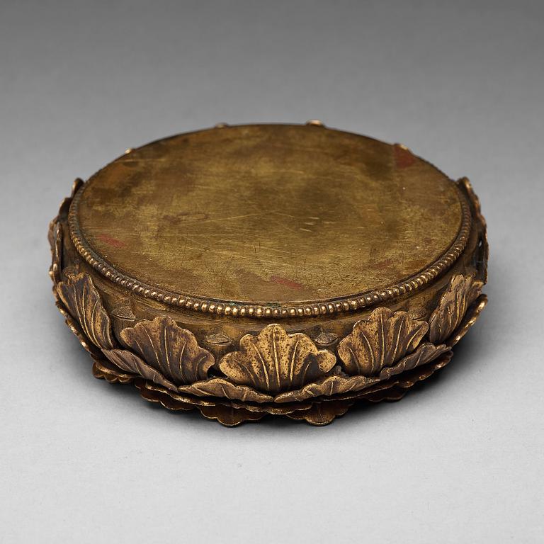 A gilt copper alloy stand/ritual object, 18th Century, probably Mongolian.