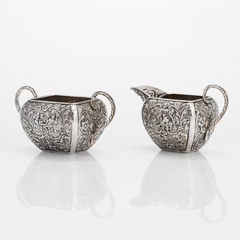 A 1940s Dutch silver sugar bowl and cream jug on a tray, Amsterdam, 1947 and 1942.