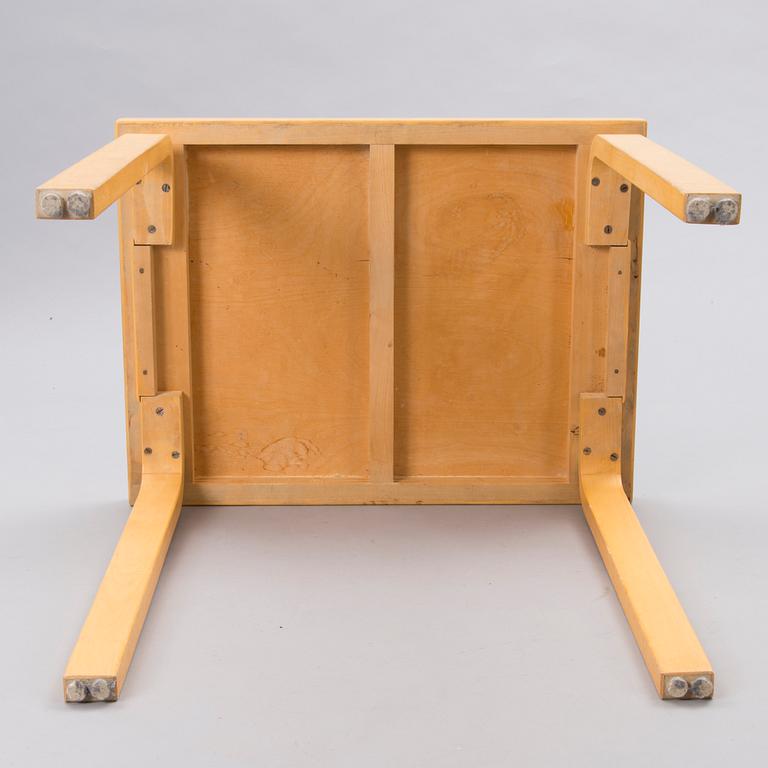 A mid-20th Century table, Artek.