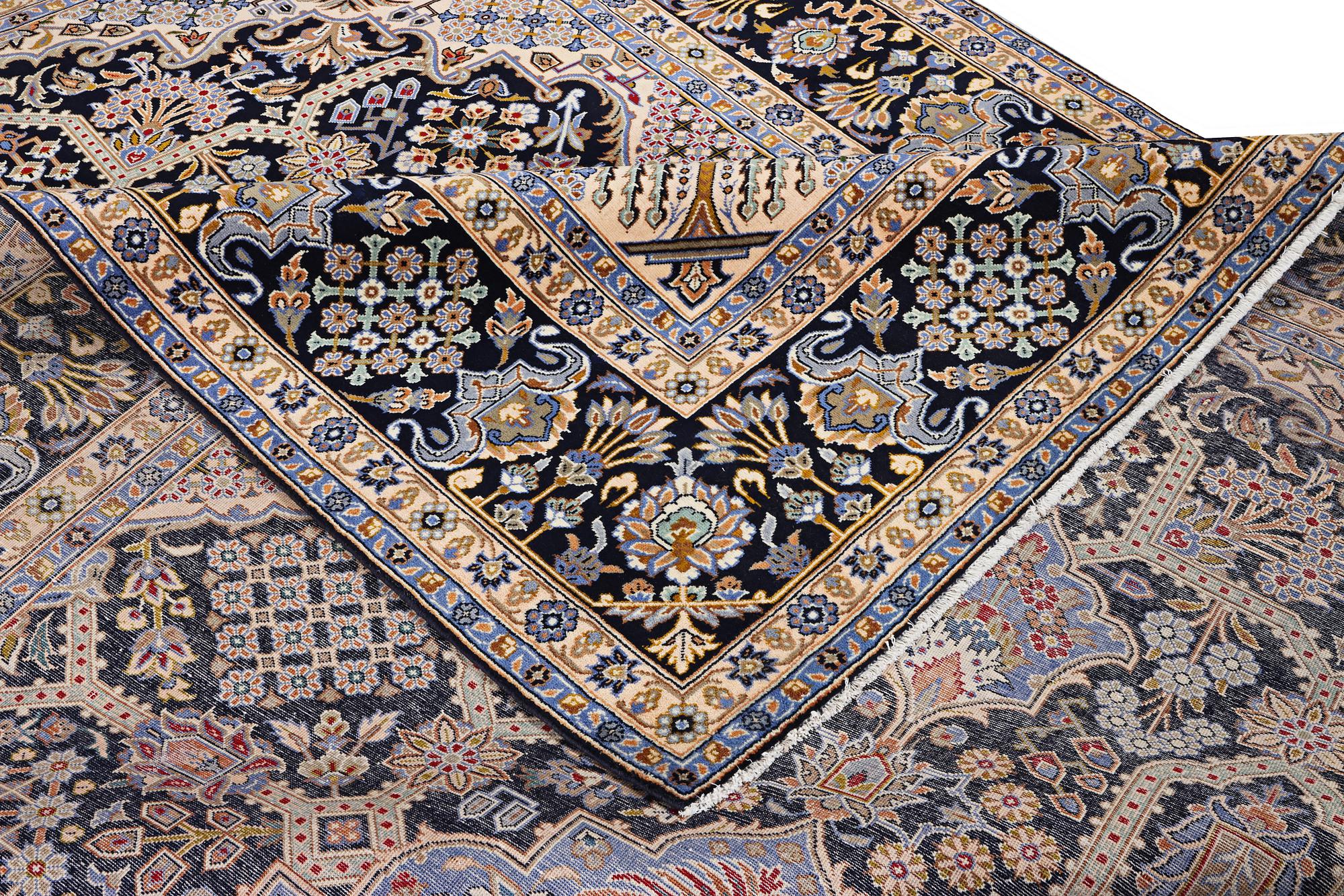 A Kashan carpet, c. 407 x 285 cm.