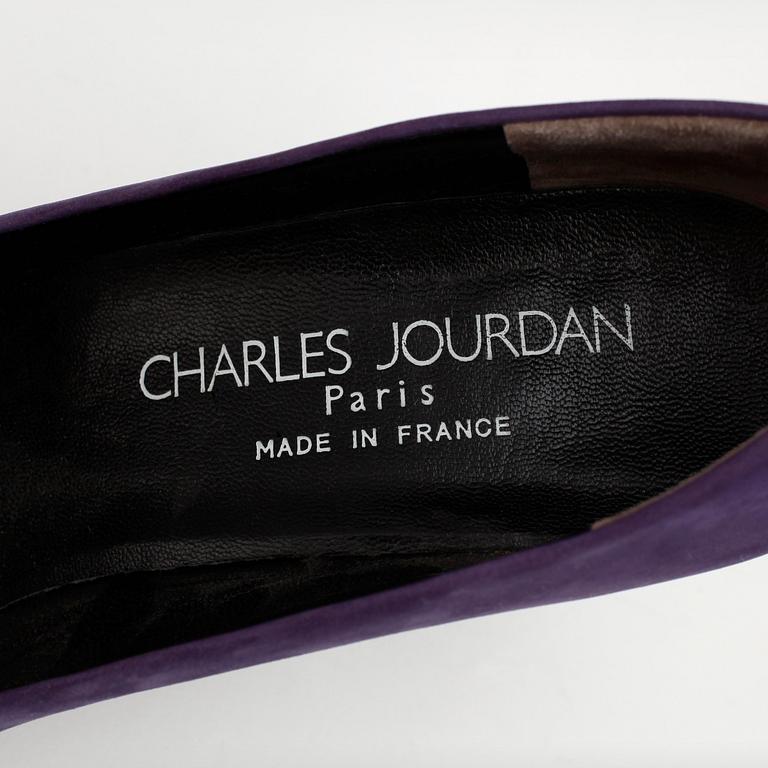 CHARLES JOURDAN, a pair of purple leather pumps.