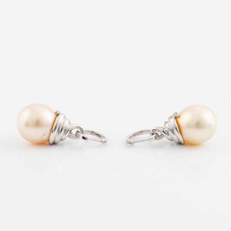 A pair of 18K white gold cultured South Sea pearl earrings.