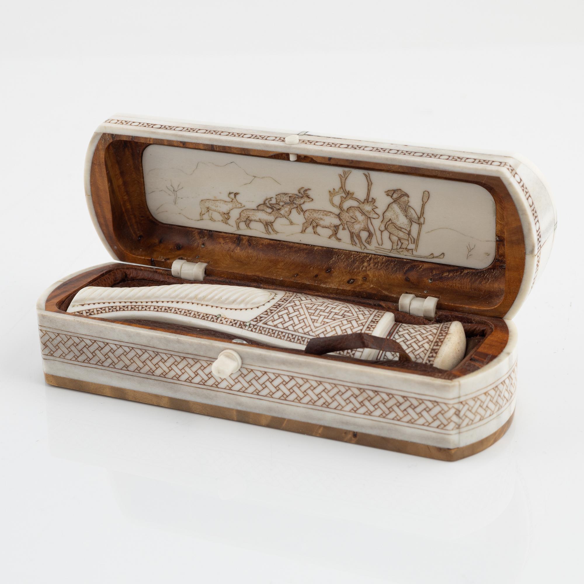 A reindeer horn knife in box by Bertil Fällman, signed.