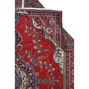 A Tabriz carpet, c 394 x 302 cm.