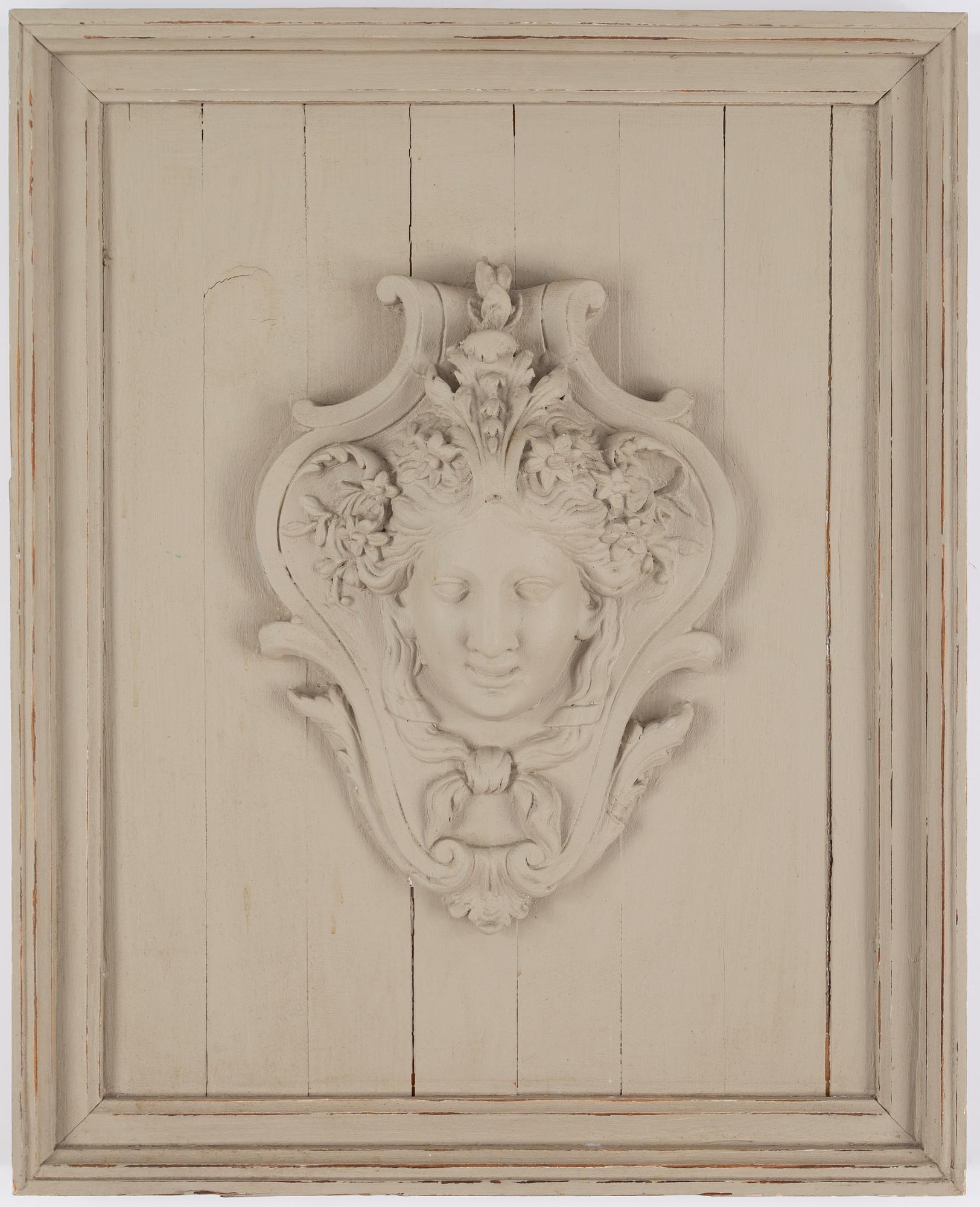 Wall relief, 20th Century, painted plaster & wood.