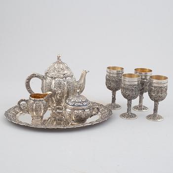 E.Jäntti, four silver cups, a three-piece silver coffee service and a silver tray, Helsinki, Finland,1979-81.