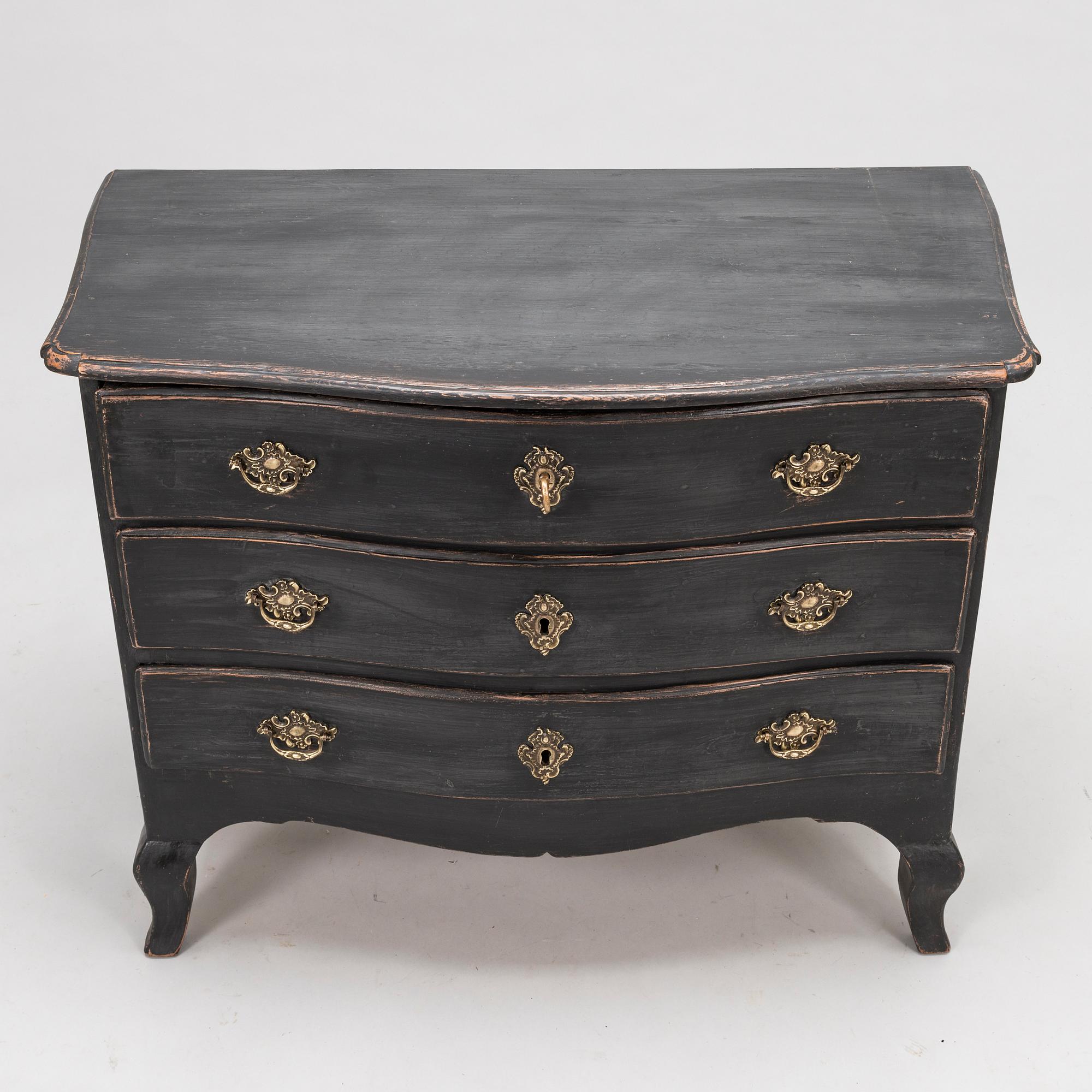 An 18th-Century chest of drawers.