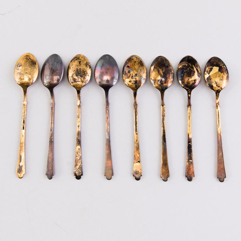 EGON LAURIDSEN, Eight parcel gilt and enamelled sterling silver coffee spoons, Copenhagen, Denmark.