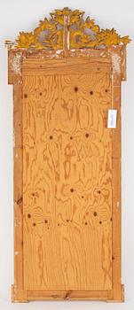 A mirror and console table from around the year 1900.