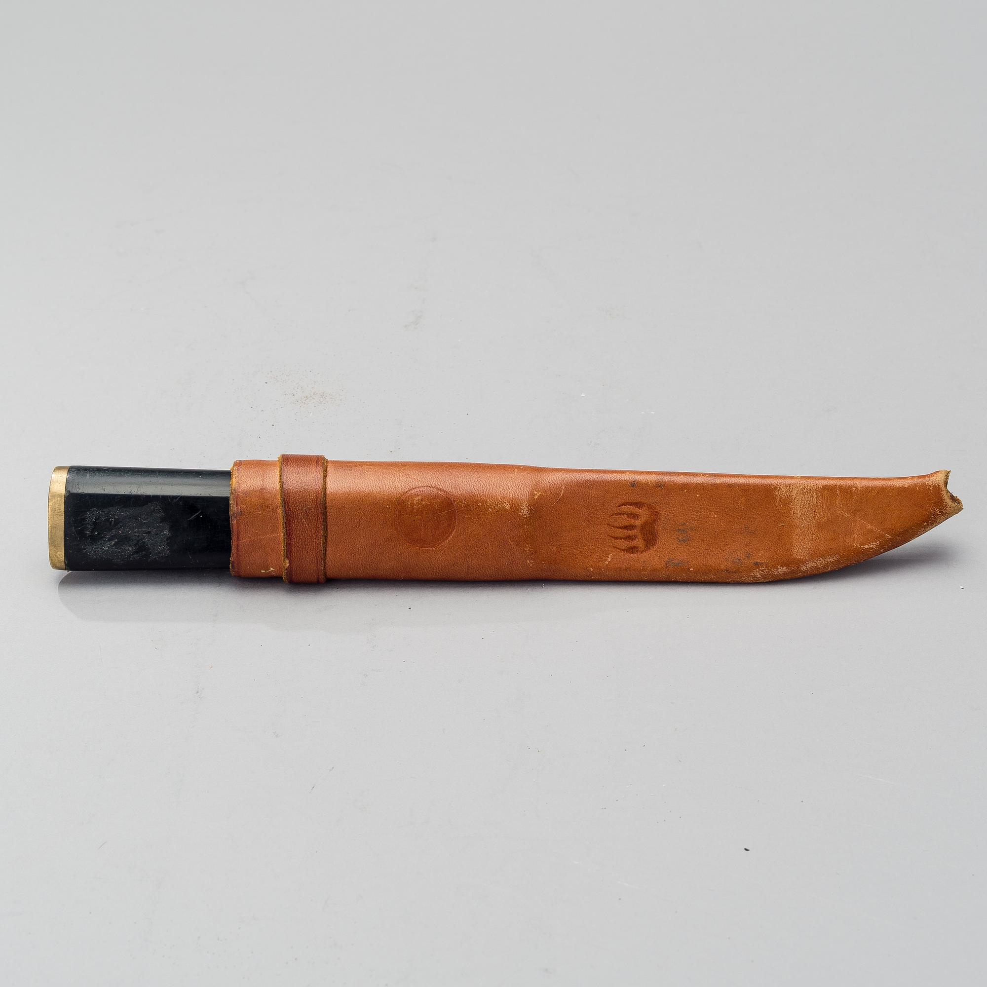 TAPIO WIRKKALA, PUUKKO-KNIFE, stainless steel, nylon and brass, Hackman Finland. Model designed in 1961.